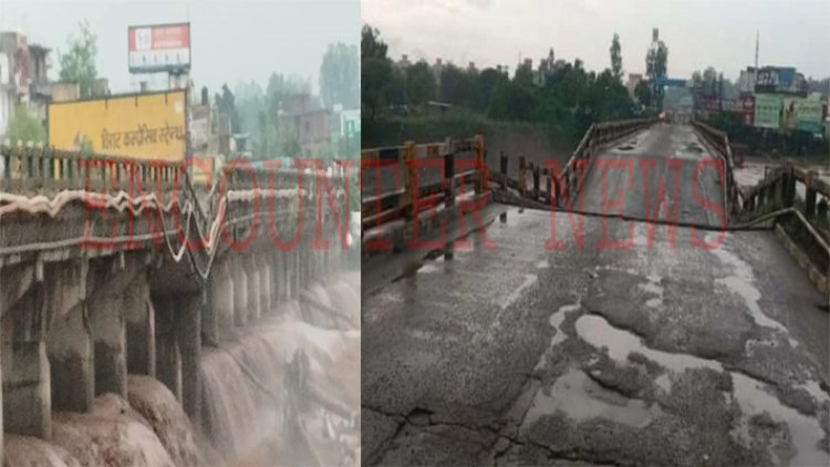 भारी बारिश से टूटा पुल, राज्य के 12 जिलों में रेड अलर्ट, देखें वीडियो