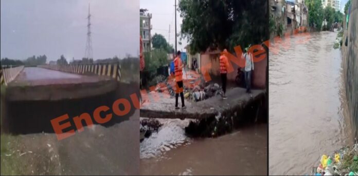 नदी पर बना पुल टूटा, बरसाती नाले में बहे युवक, देखें वीडियो