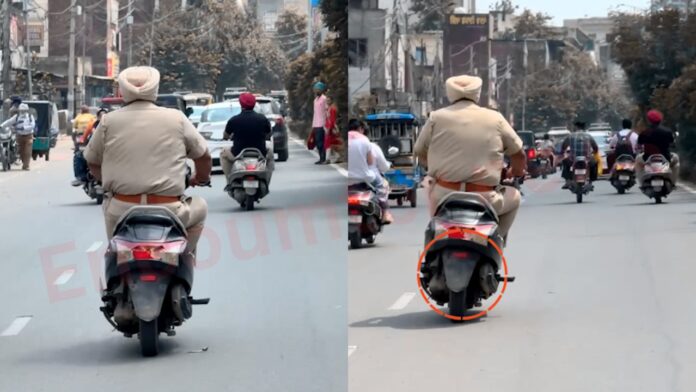 Punjab News: खुद उड़ा रहे ट्रैफिक नियमों की धज्जियां, बिना नंबरी एक्टिवा पर सवार पुलिस कर्मी, देखें वीडियो
