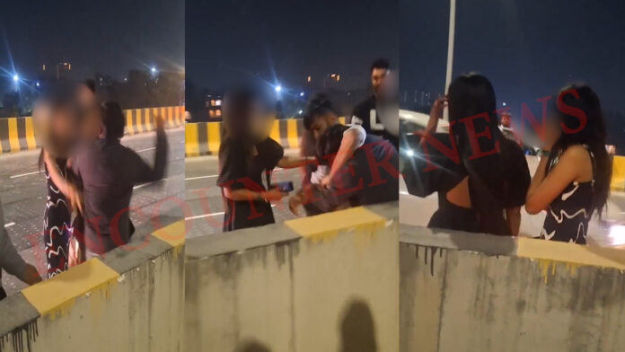 हाइटेक सिटी में सड़क के बीच मारपीट, बीच-बचाव करने आई युवती को भी जड़ा थप्पड़, देखें वीडियो